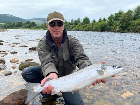 Ant Mason with a long tailed liced Grilse

