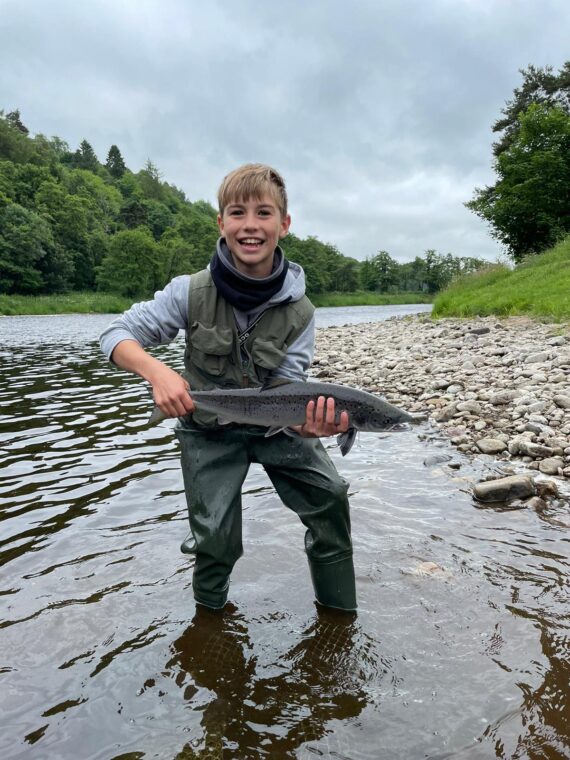 Young James Robertson with a nice grilse to his own rod.


