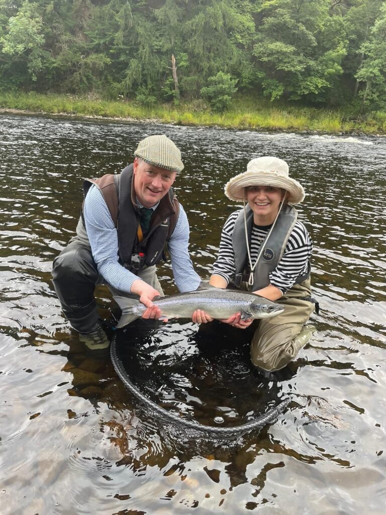 Anna-Gallo-with-her-first-ever-fish-in-Sourden-with-ghillie-Grant-768x1024.jpg